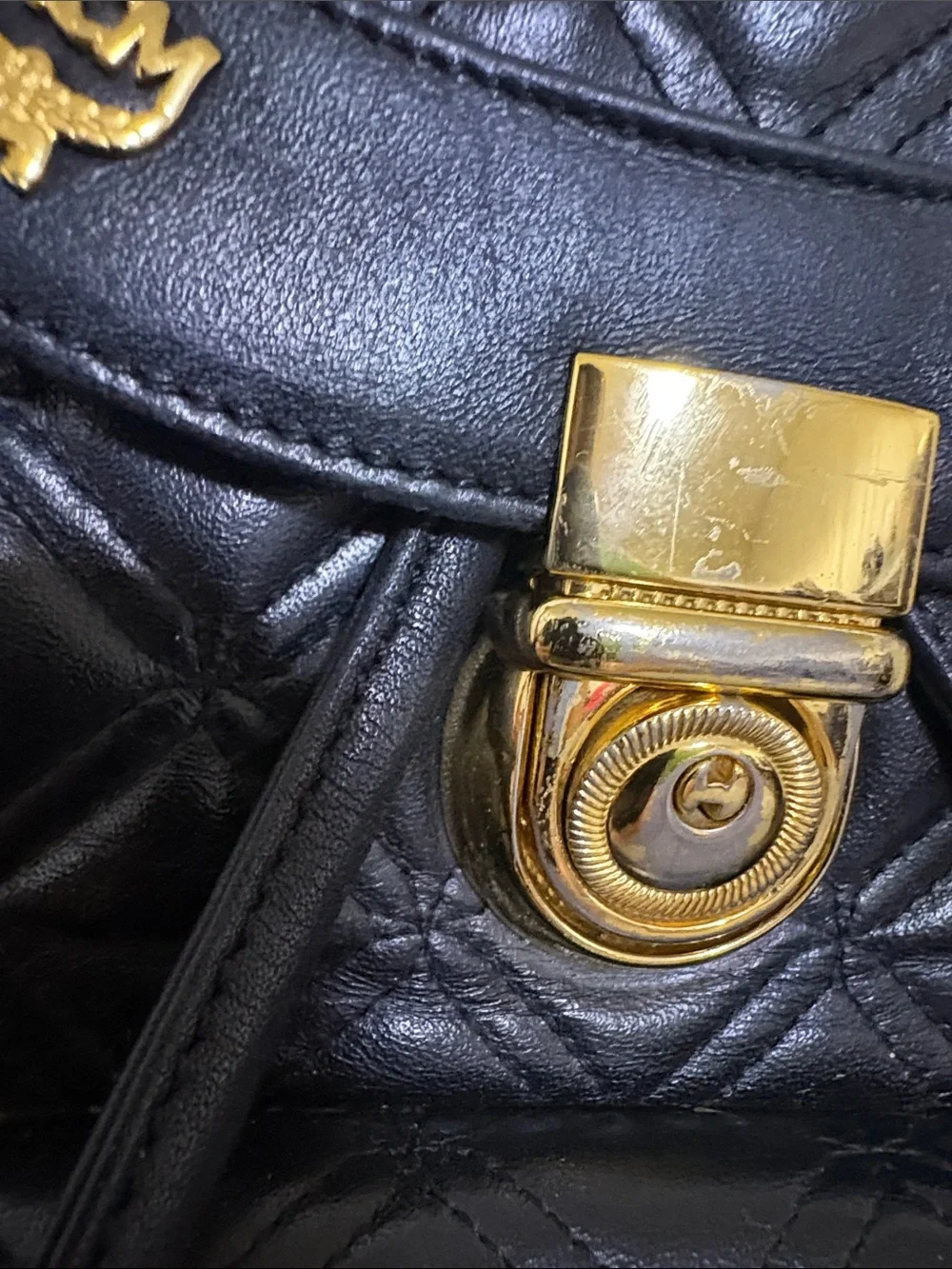 MCM Black Quilted Leather Mini Backpack with Gold Accents